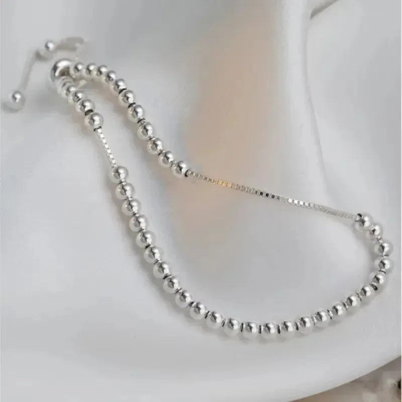 Pulsera de Cuentas Redondas en Plata 925 – Ajustable y Unisex