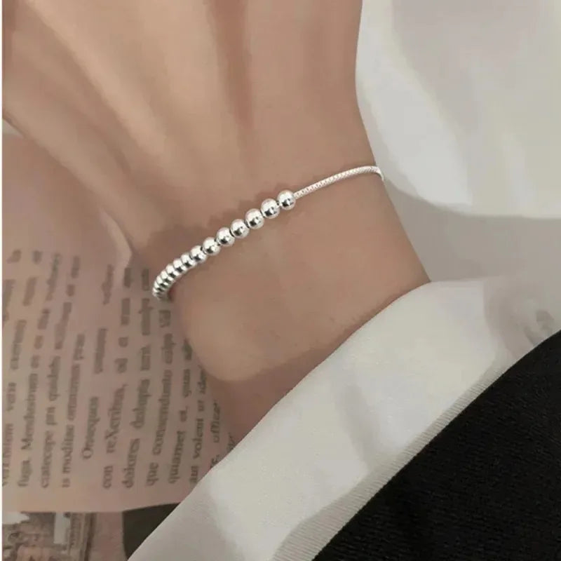 Pulsera de Cuentas Redondas en Plata 925 – Ajustable y Unisex