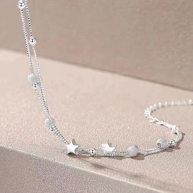 Pulsera de Estrellas Doble Capa en Plata 925 – Ajustable y Elegante